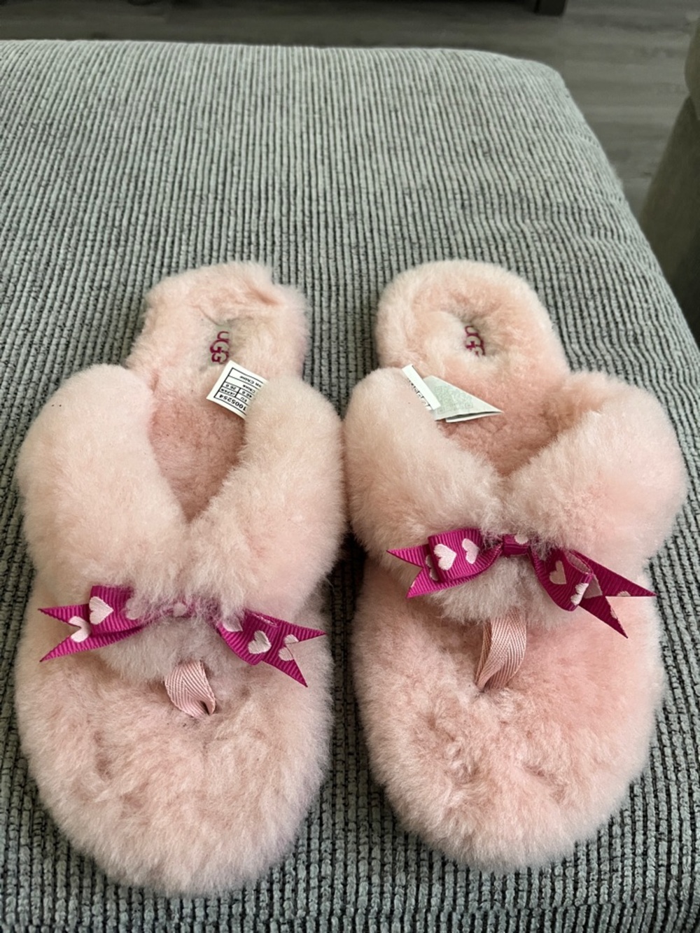 UGG Pink Shearling Slide Slippers with Heart Ribbon Accent